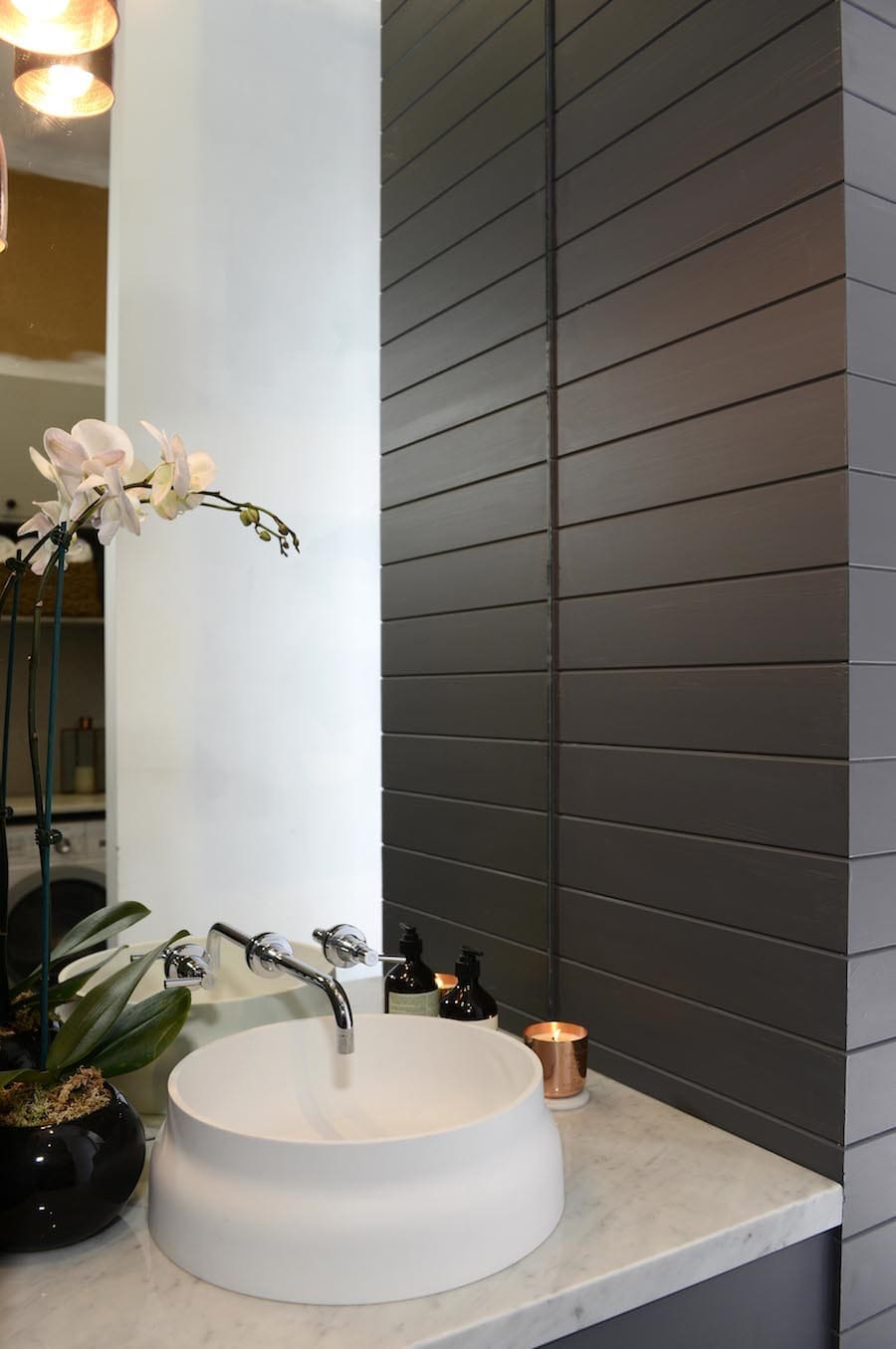 Powder room with grey wall