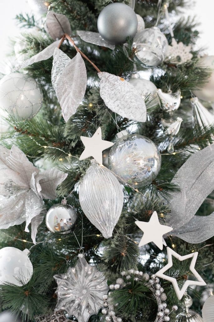 Beautiful clay Christmas stars on Christmas tree
