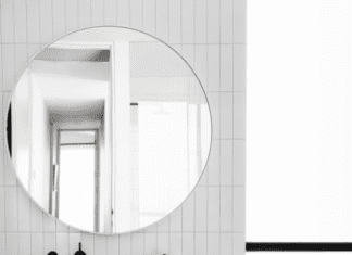 Round mirror in bathroom