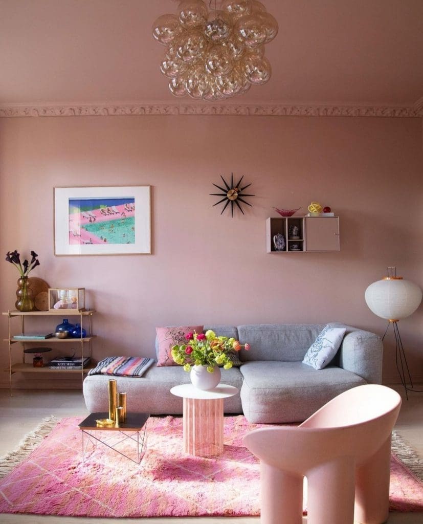 pink living room with grey couch