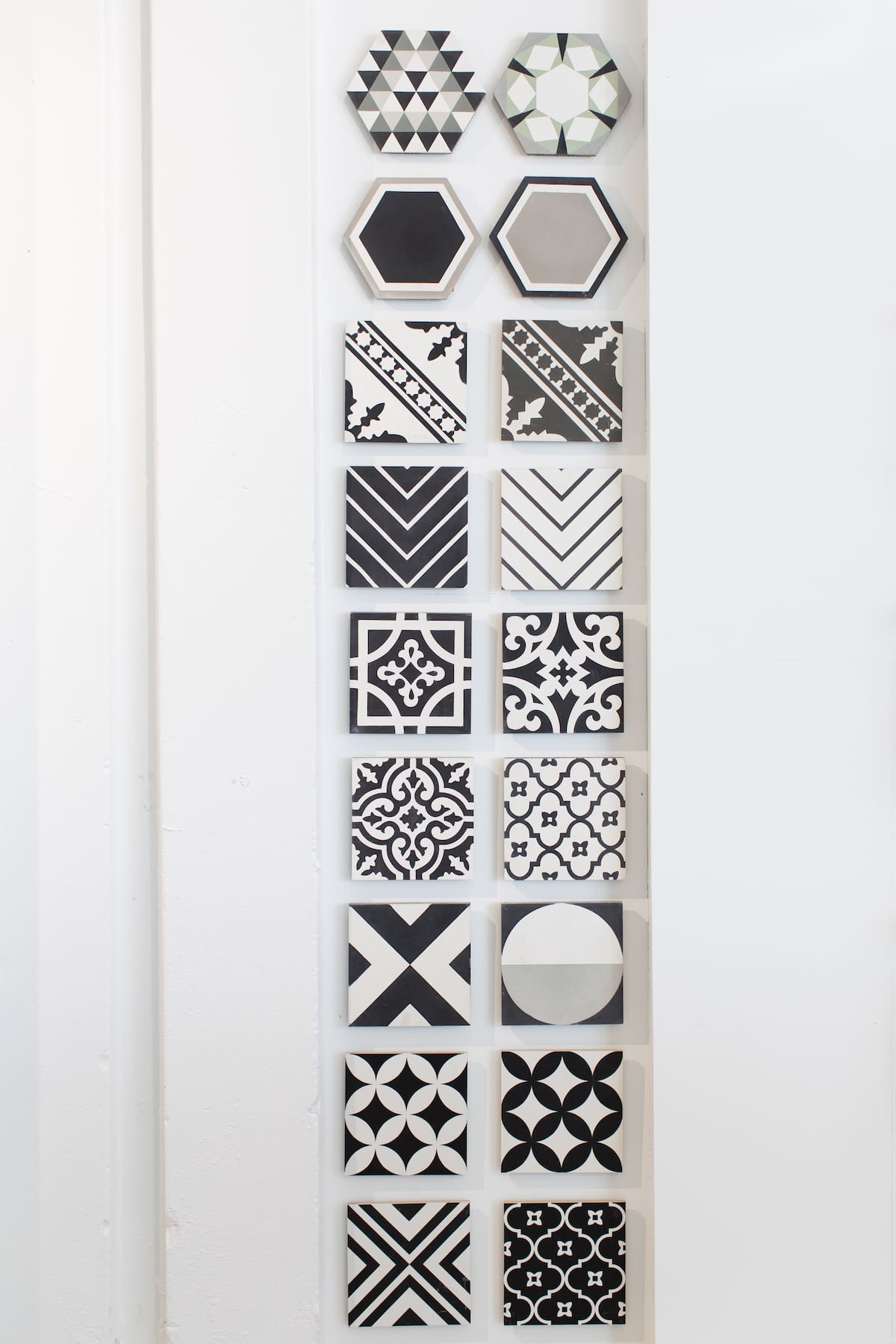 Wall of black and white encaustic tiles