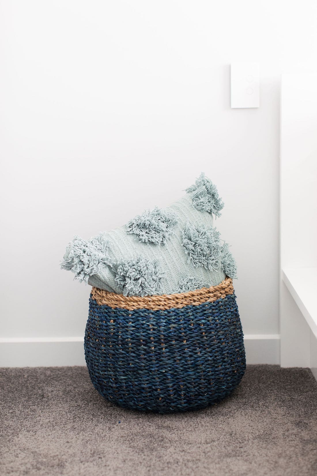 Coastal cushions in basket