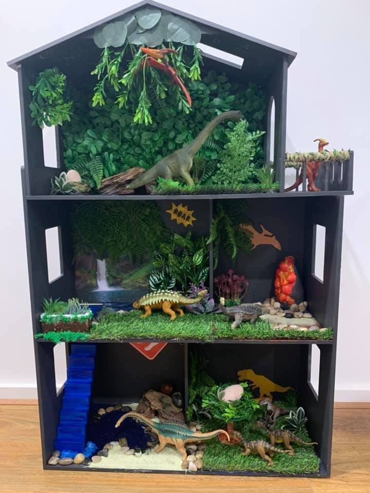 Dinosaur doll house