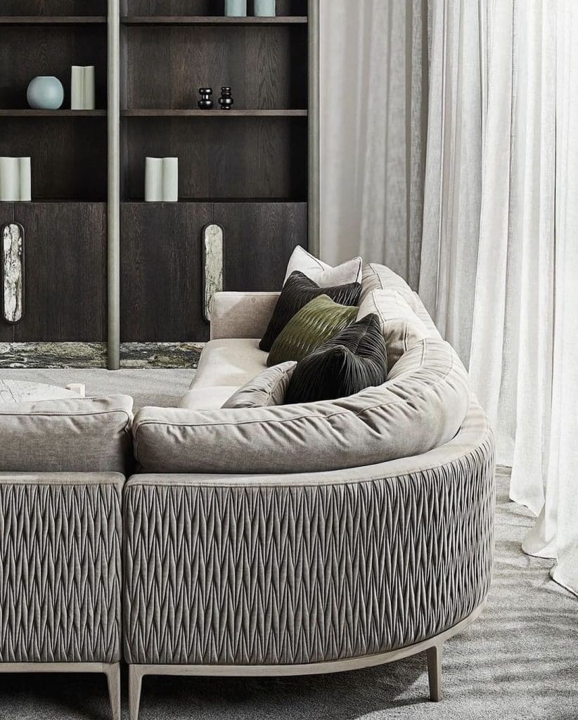 Grey Zuster sofa with quilted backing investment pieces you need in your home