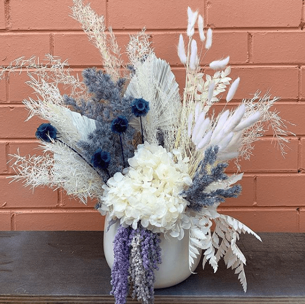 Blue Dried floral arrangement by Alitalia Florist