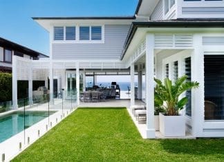 Coastal Australian Hamptons home facade with pool