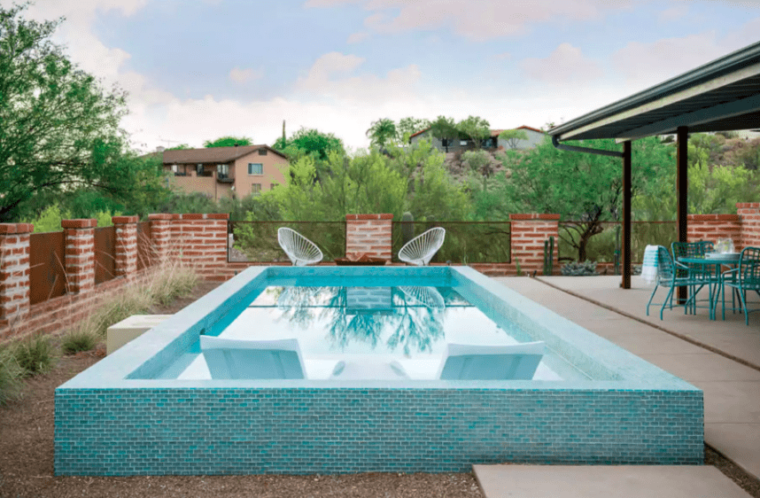 Coloured tile pool with blue mosaic tiles