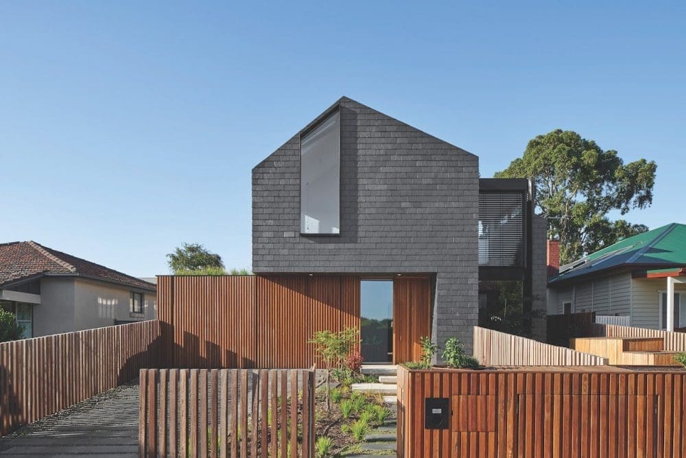 Exterior of Maxwell home with slate and timber materials