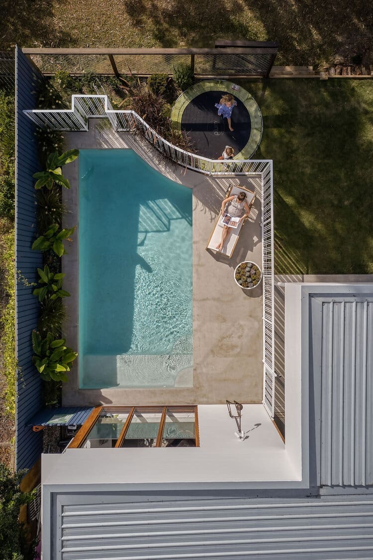Birds eyeview of unique shaped pool