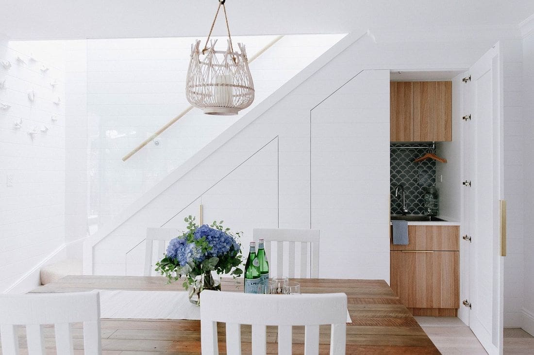 Under-stair laundry with door half open