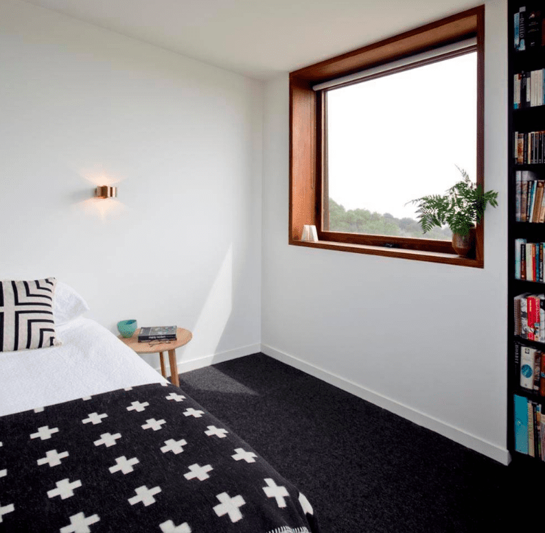 Black carpet in modern bedroom