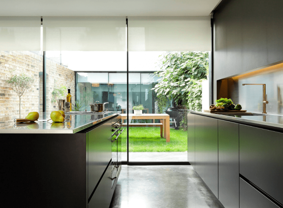 Black polished concrete floors in kitchen