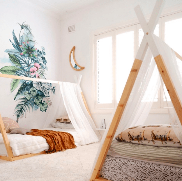 Teepee beds in shared bedroom