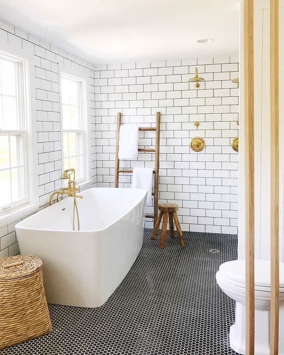 Black and white bathroom with gold accents