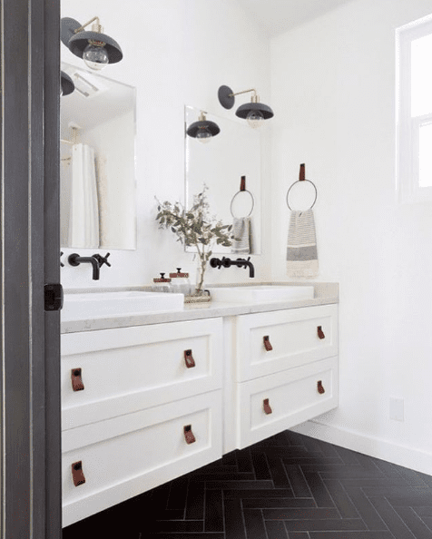 Matte black herringbone flooring