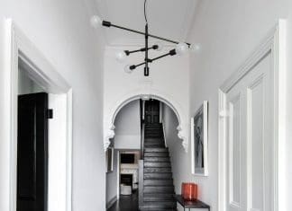 Curved ornate doorways with black floors