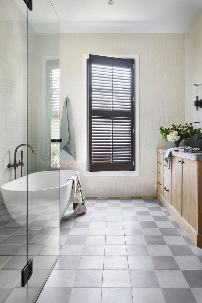 Checker floor in farmhouse bathroom