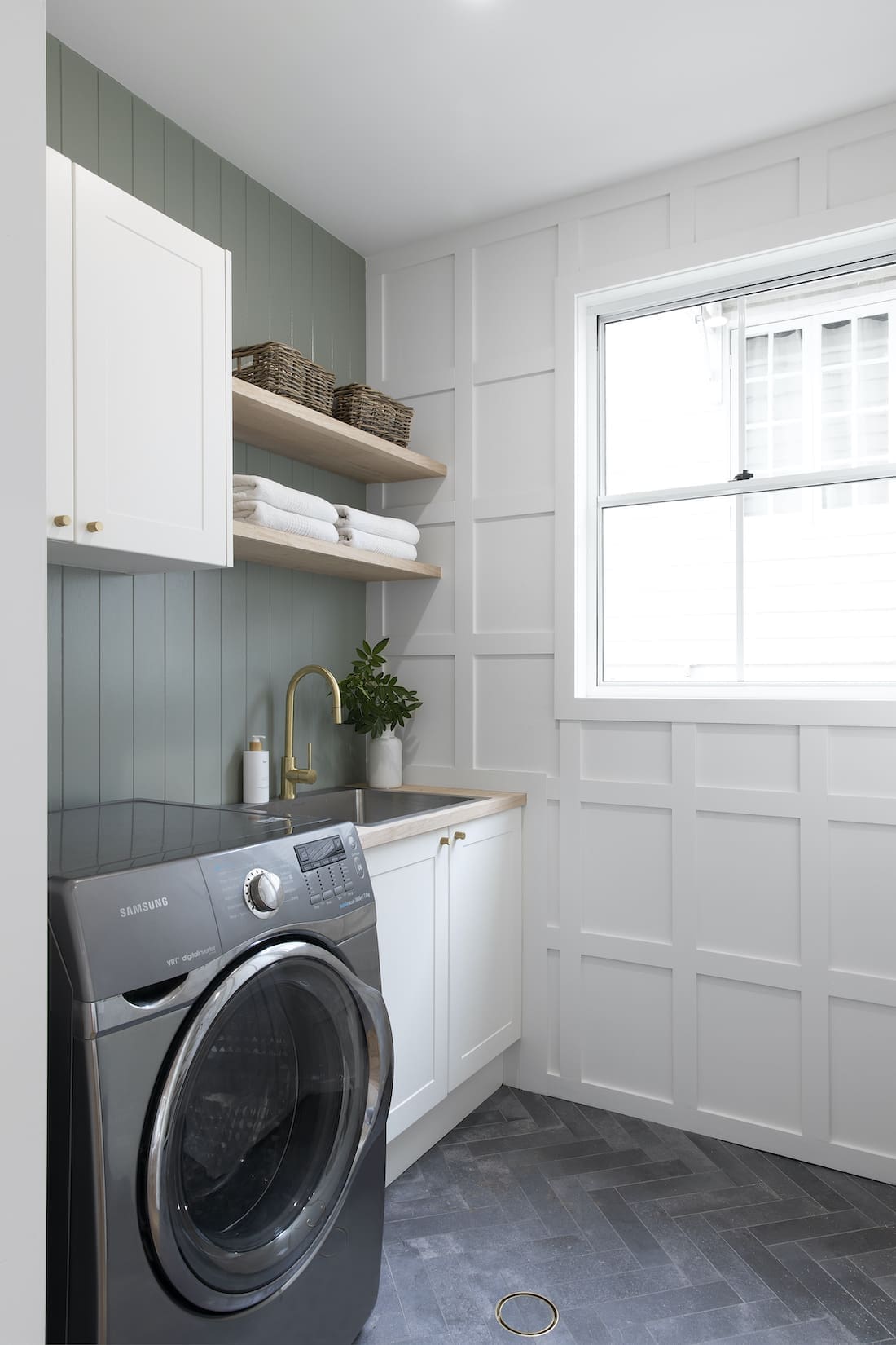 White wainscoat wall in laundry