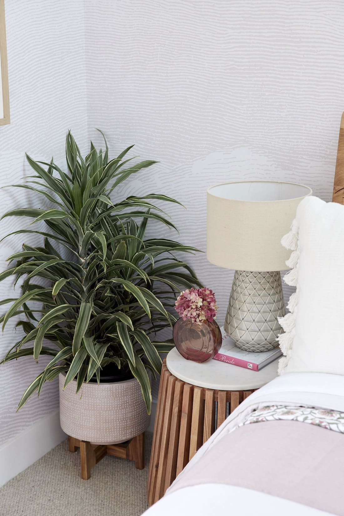 Bedside table and indoor plant