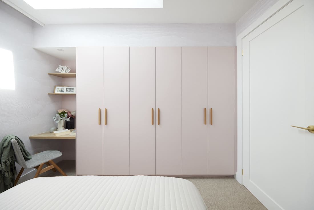 Guest bedroom with blush built in wardrobe