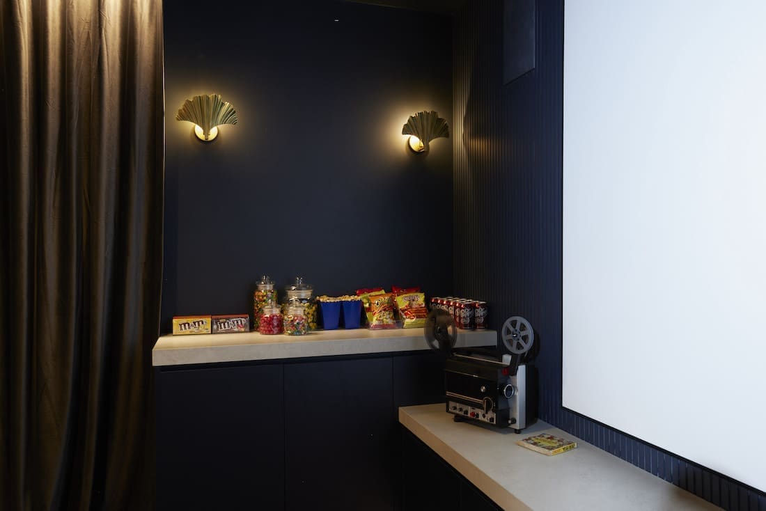 Snack set up and vintage projector in at home cinema
