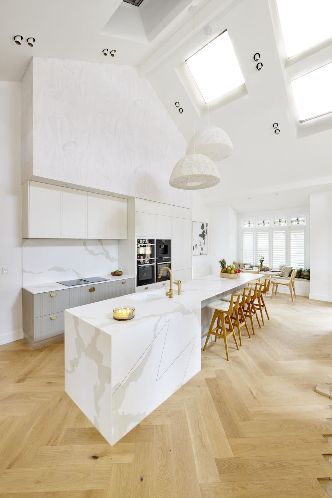 Marble benchtop in white and timber kitchen