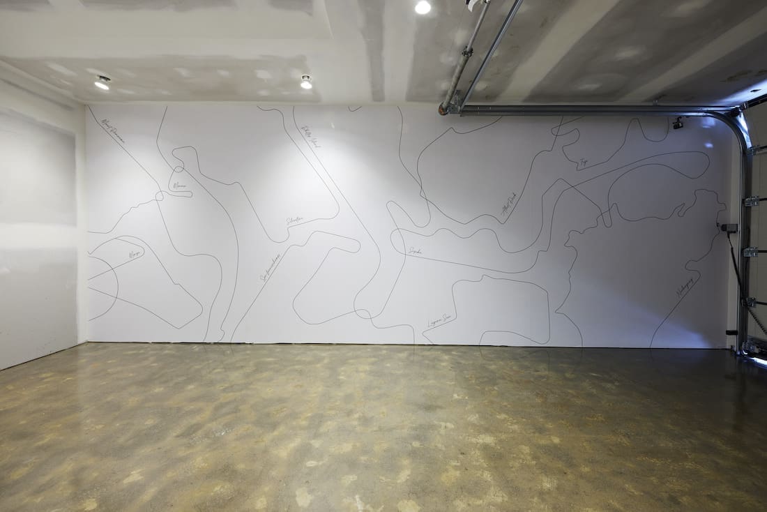 Race track mural in garage
