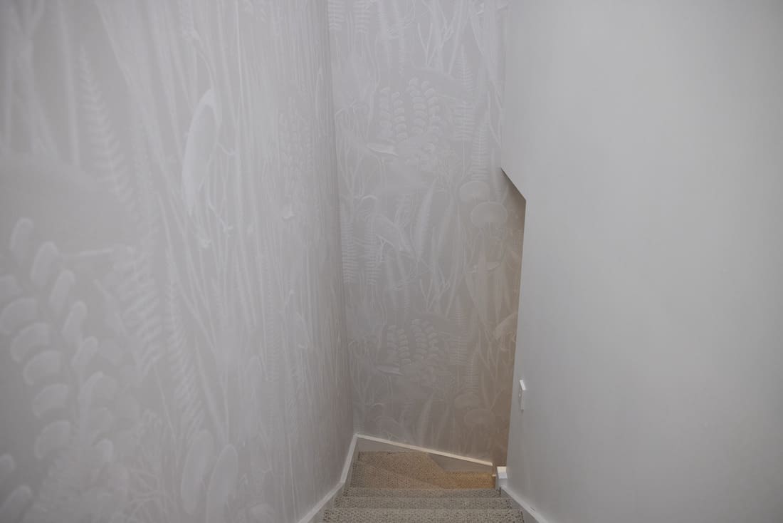Floor to ceiling wall paper staircase