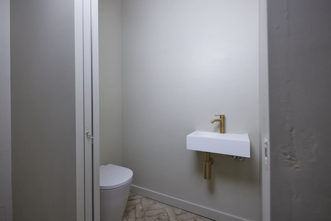 Small basement powder room