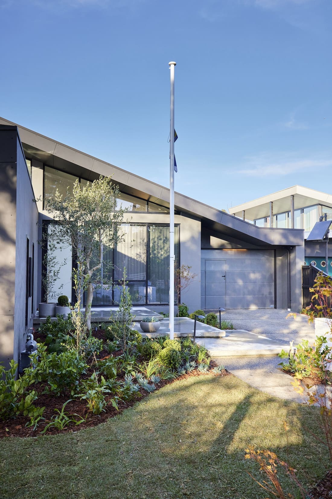 Modern facade of home with slanted roof