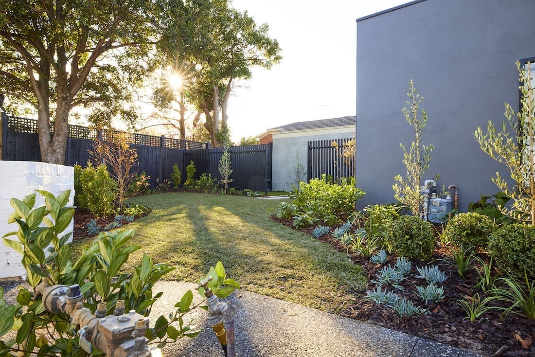 Grassed area with landscaped gardens