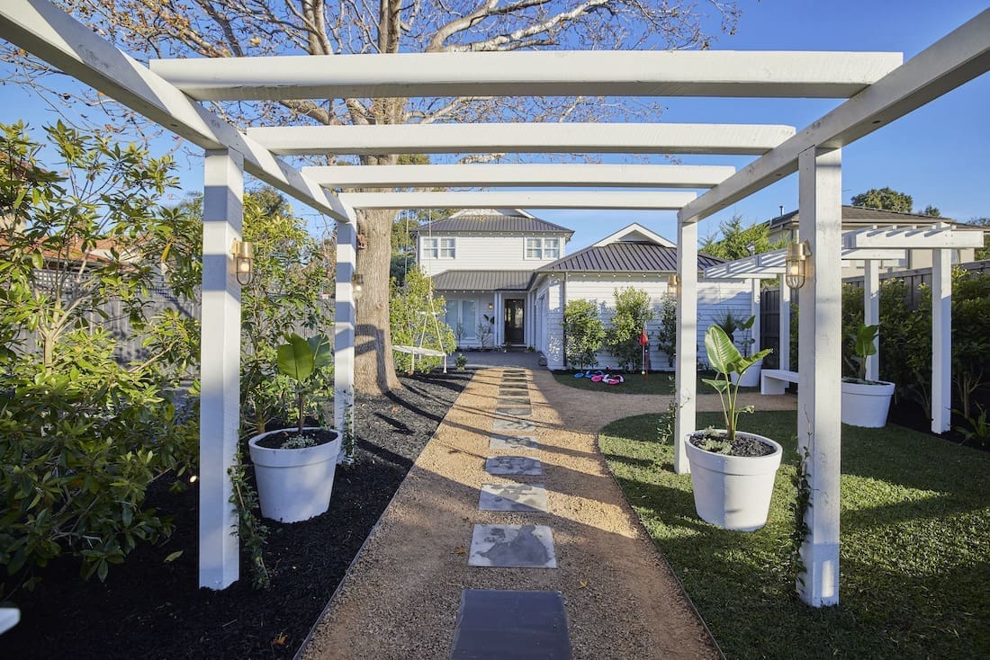 White arbour entrance to garden
