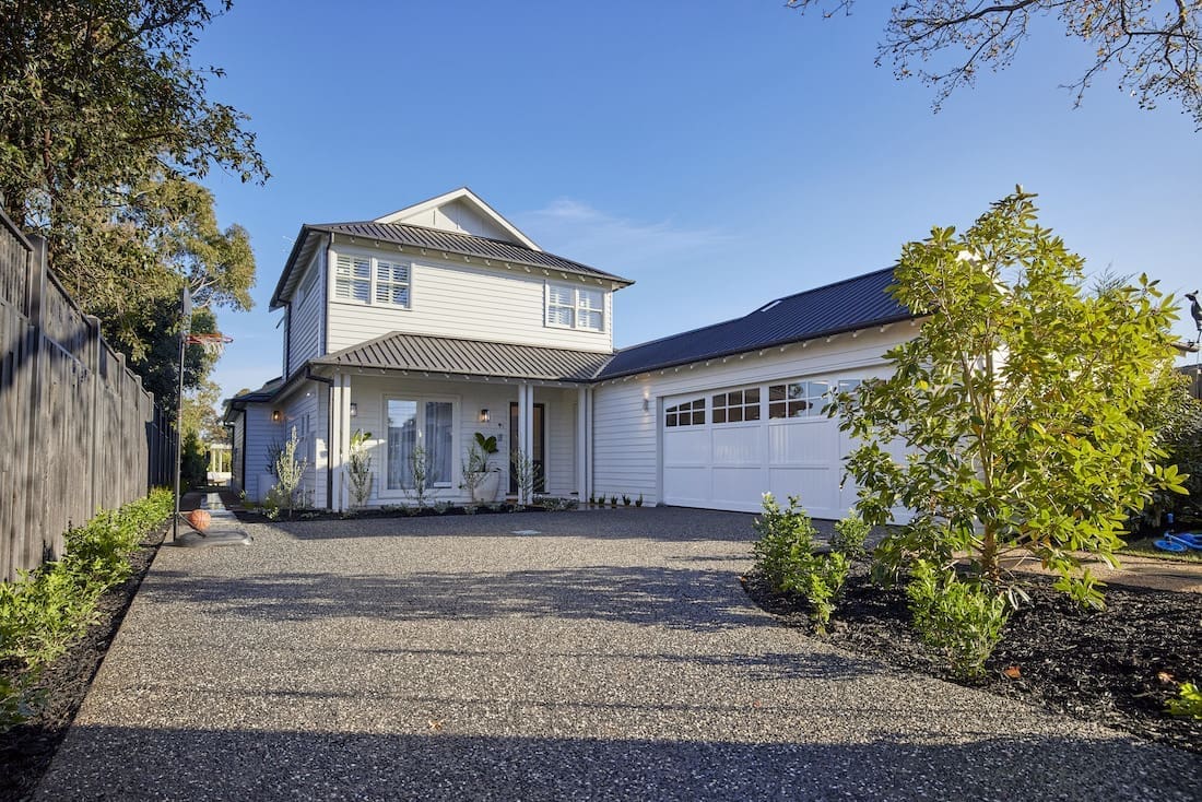 Front entrance, driveway and garage of home