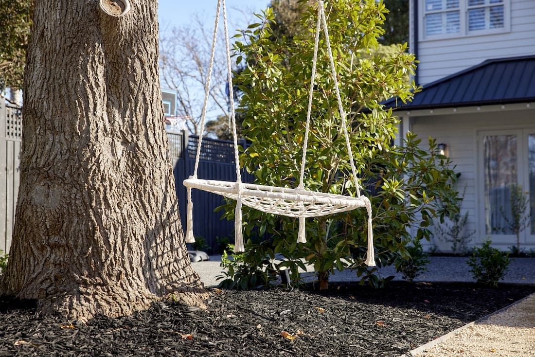 Macrame rope swing in front garden