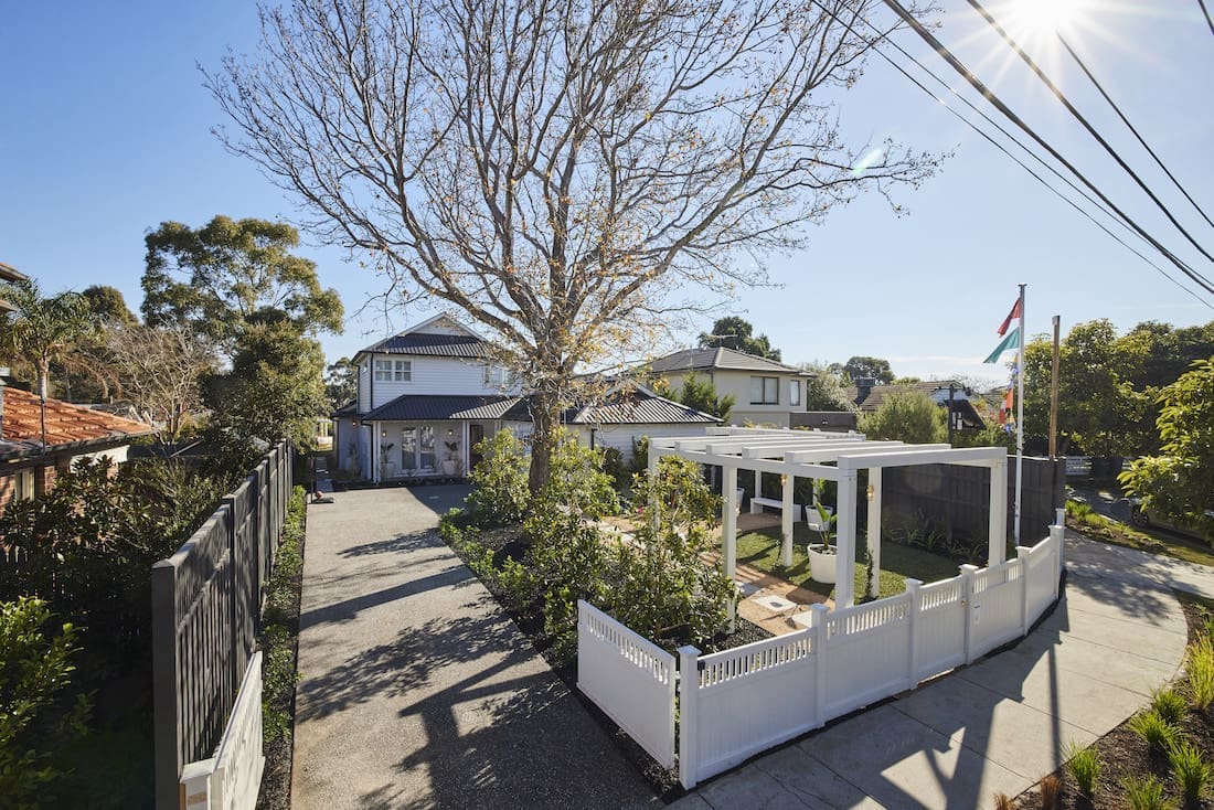 Street view of Hamptons style home