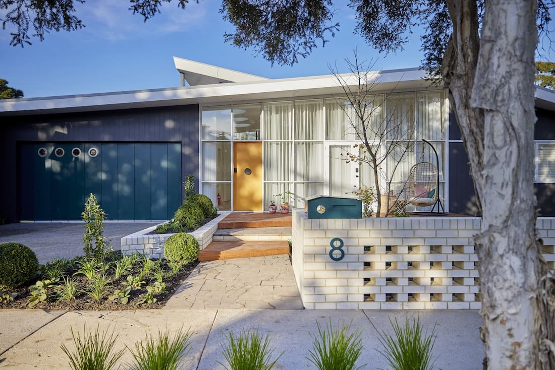 Modern 70s home with yellow front door