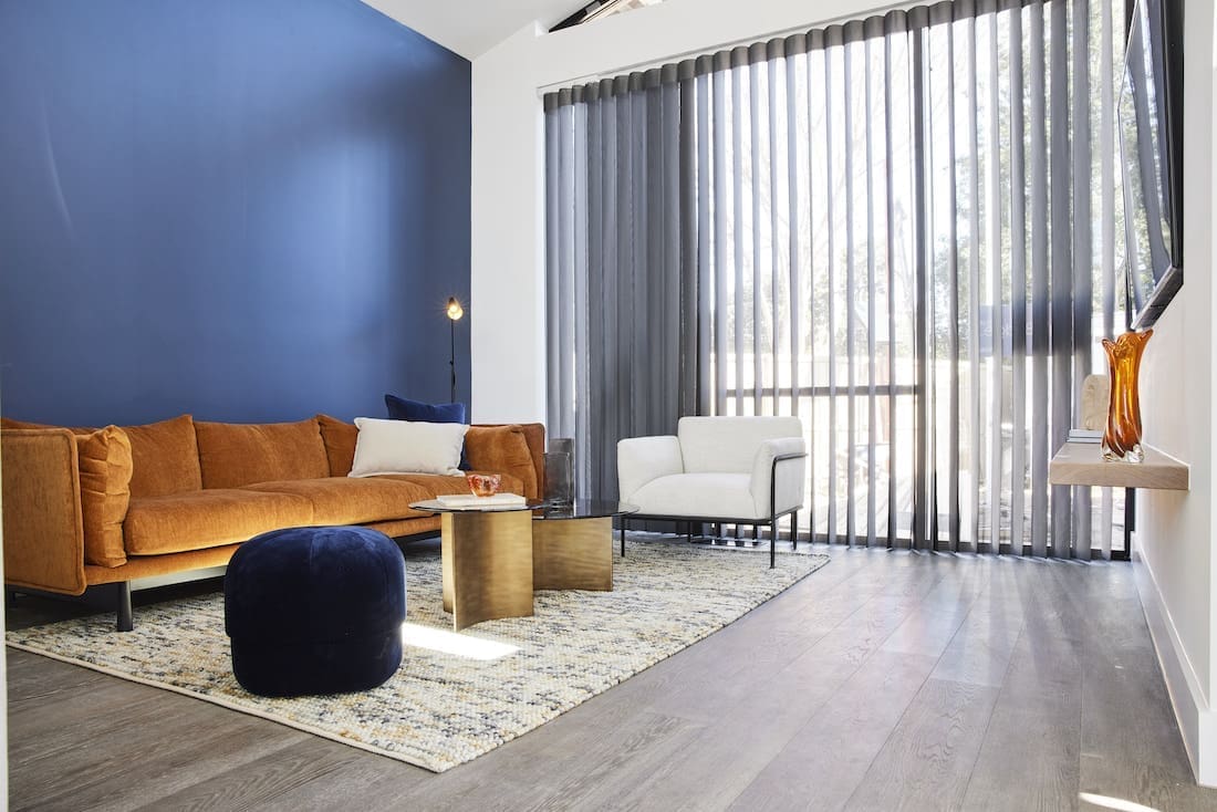 Living room with blue feature wall