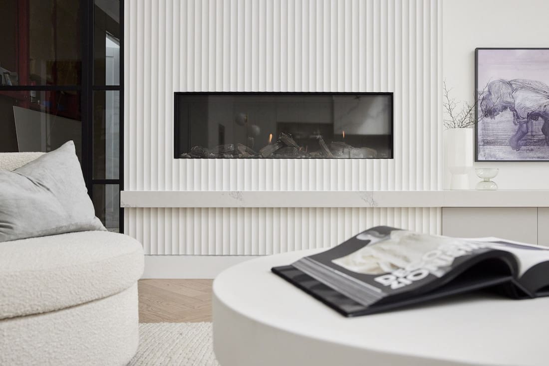 Scalloped wall with fireplace