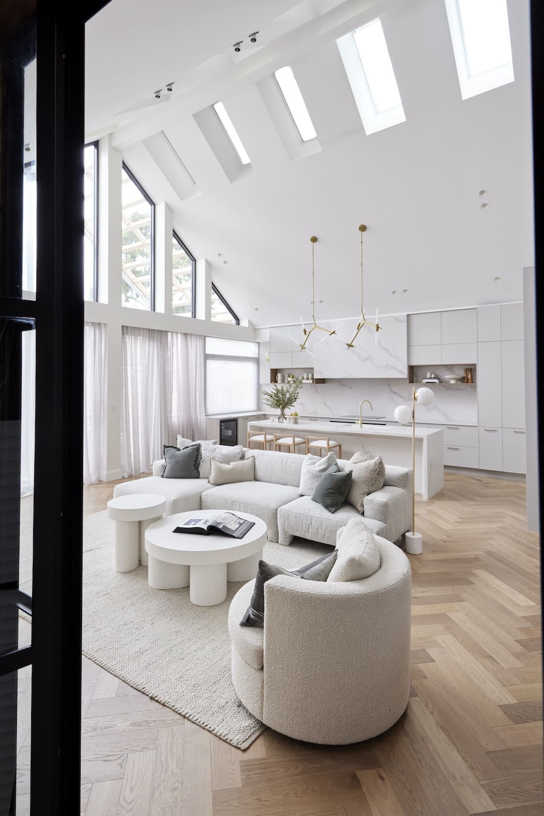 Living space seating area with view to kitchen