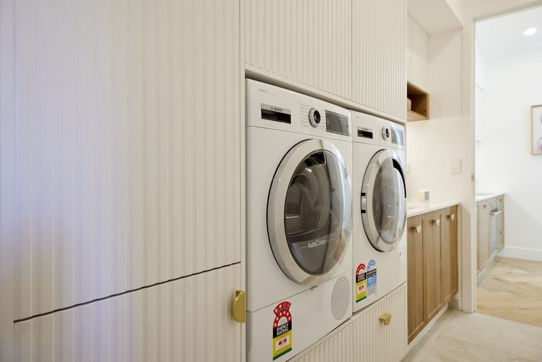 Panelled laundry cabinetry