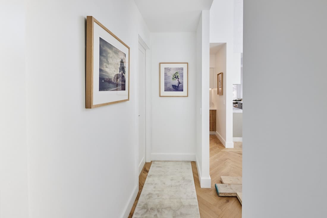 Hallway with runner and artwork