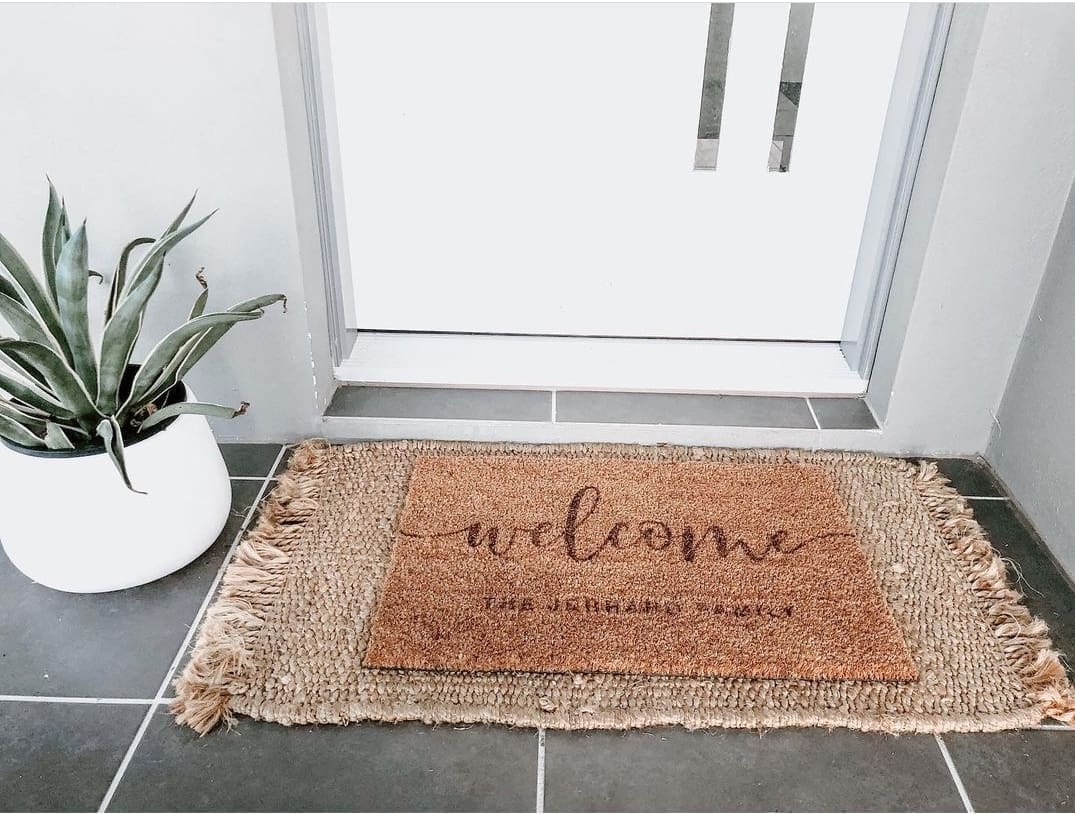Layered door mat with Kmart mat