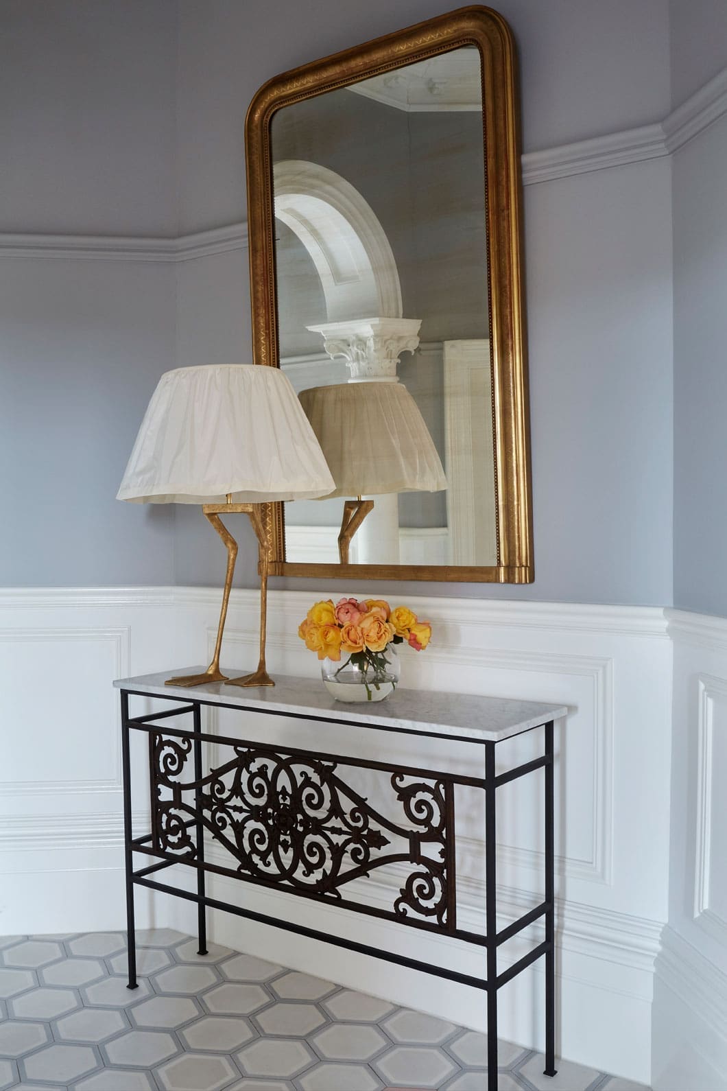Entry hall table with stork leg lamp