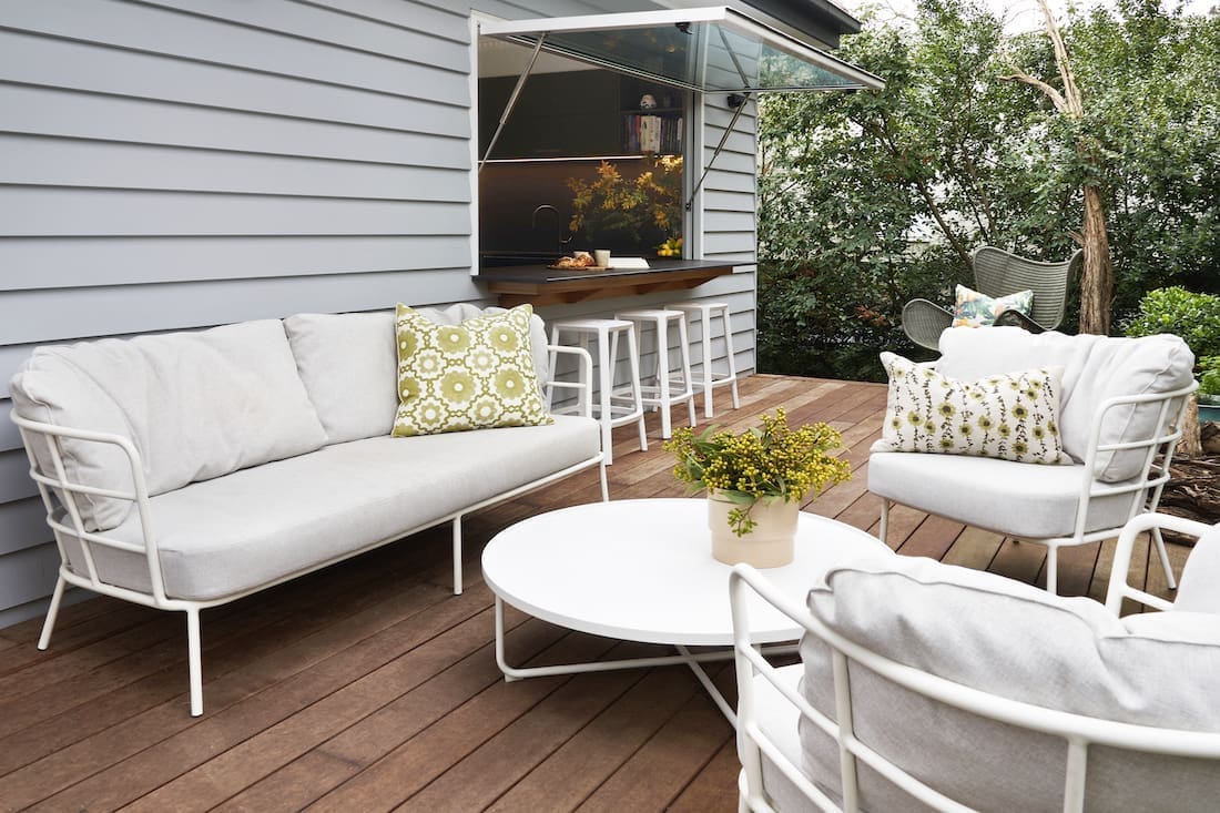 Outdoor deck with gas strut window