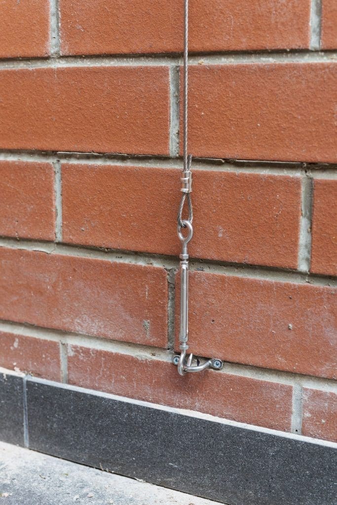 Hook attached to wall bracket