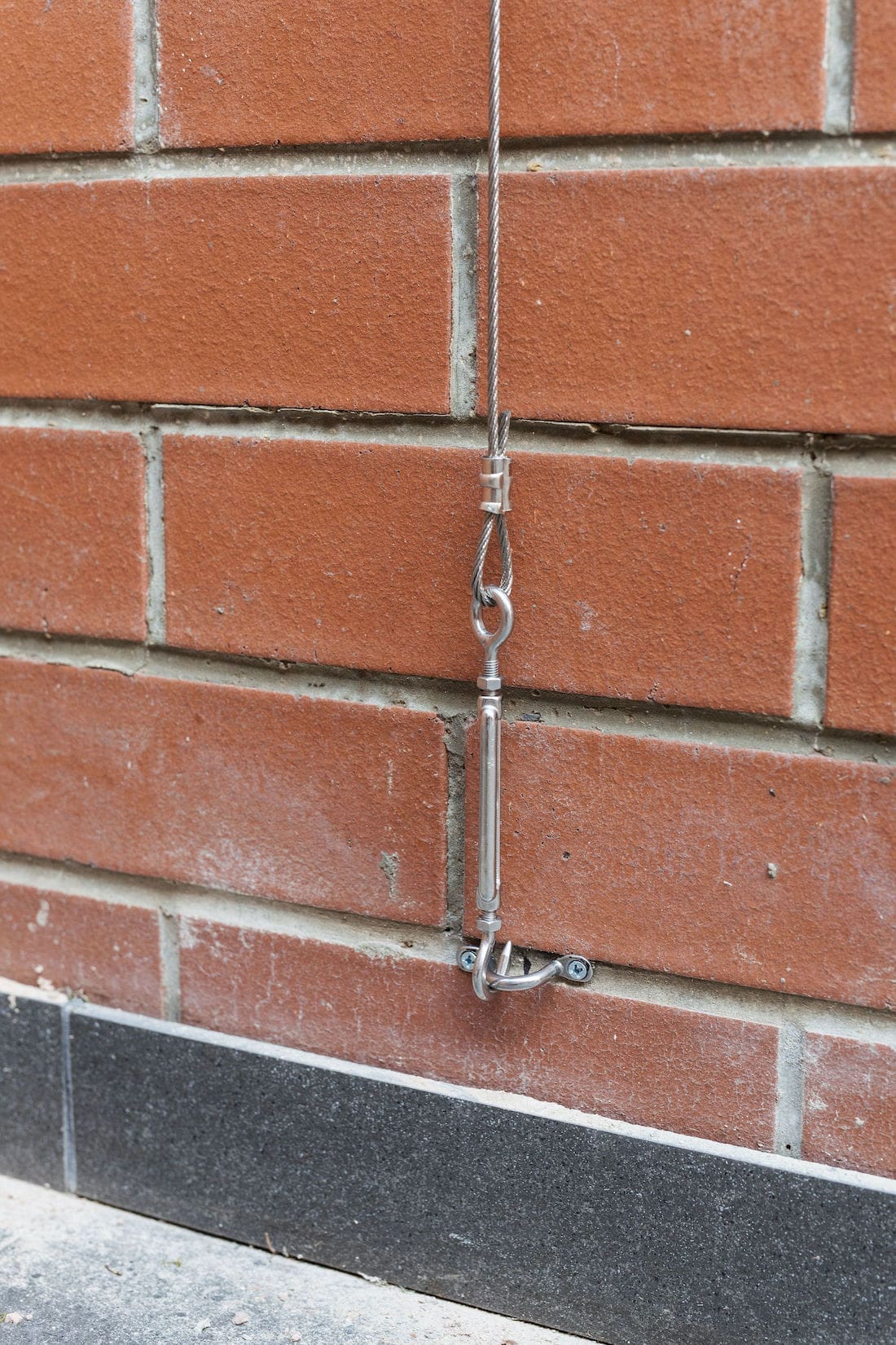 Hook attached to wall bracket