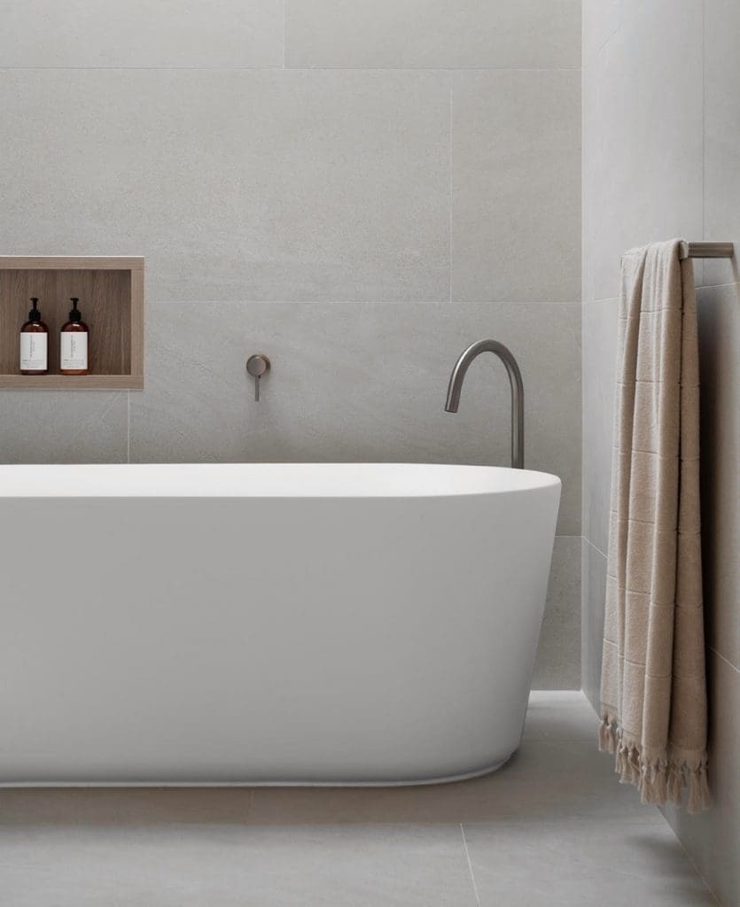 gunmetal tapware in grey bathroom