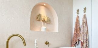 brass tapware and white tub _ earthy coastal bathroom