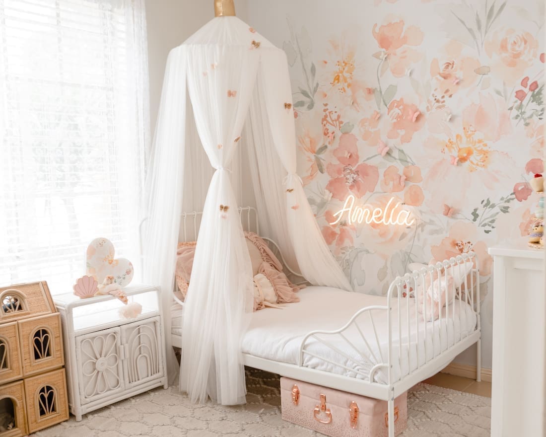 pink girls bedroom with neon light