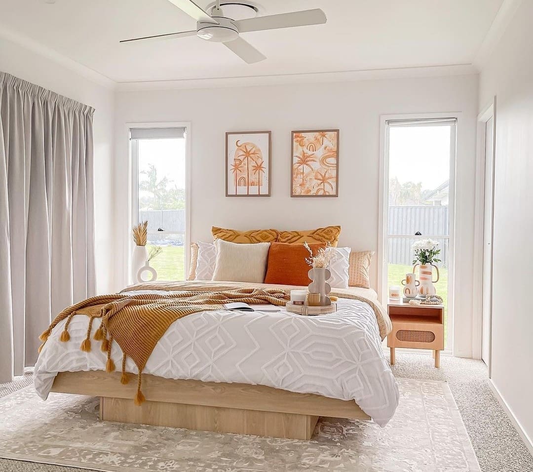 orange bedroom styling _ King bed cushion styling